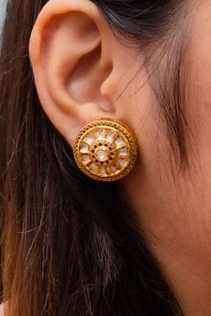 About : These are a beautiful pair of studs with Gold Plating and the finest quality of Kundan. These studs are in a gold-tone and will match a variety of outfits. You can wear then with a sensible workplace formal, traditional outfits, western, into-western, or casual gatherings. Details : Option 1: Red Color (Design 774) Option 2: White Color (Design 775) Best for gifting or for personal use, wear it to any occasion and be the spotlight. Eye-catching and unique jewelry that will set you apart. Elegant Gold Stud Earrings, Kids Handicraft, Saree Petticoat, Saree Jewellery, Silver Pooja Items, Glass Bangles, Silver Toe Rings, Gold Chain With Pendant, Kundan Earrings