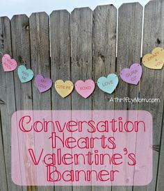 conversation hearts valentine's banner on a fence with the words conversation hearts valentine's banner