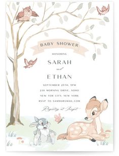 a baby shower is shown with deer and birds in the background, including a tree