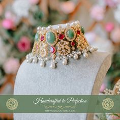 Resplendently unique! Look magnificently stunning in our Taaliyah Set featuring shimmering CZ stones and beautiful combination of stones. The set includes a pair of matching earrings. Approximate earrings length is 3.5". Gold-plated on high-quality brass as base metal. Made by order. Kindly allow 5-7 weeks for the delivery of this item. For custom or urgent requests, please contact support@alacouture.com. *Please Note: We use faux stones and beads in all of our jewelry. Elegant Stone-set Jewelry For Wedding, Luxury Stone Work Jewelry Sets For Festive Occasion, Elegant Kundan Jewelry Sets With Stones, Bollywood Gemstone Jewelry Sets For Wedding, Bollywood Style Wedding Jewelry Sets With Gemstones, Bollywood Style Wedding Jewelry With Stones, Fusion Style Jeweled Jewelry Sets For Wedding, Faux Stone, Cz Stone