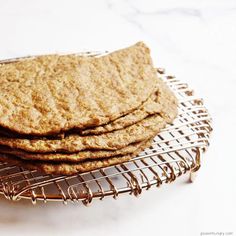 a stack of cookies sitting on top of a metal rack