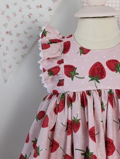 Sweet baby girl Pink with Strawberry print dress and bloomer set! Perfect to celebrate a Berry Sweet Birthday ! Available in sizes 0-3 months ,3-6 months ,6-9 months ,9-12 months ,12-18 months, and 18-24 months! Dress is handmade from high quality designer cotton fabric. The bodice is fully lined and the back of the dress has a 2 button opening for easy dressing. Diaper cover features enclosed elastic , soft to the touch and won't bother baby's skin. Please feel free to message me with any questions you may have. ** All Carolina Ruffle Co items are handmade in Fort Mill, South Carolina Follow us on Instagram @TheCarolinaRuffleCo Pink Strawberry Print Summer Dress, Pink Cotton Dress With Strawberry Print, Sweet Pink Strawberry Print Dress, Strawberry Baby Dress, Strawberry Print Dress, Playful Strawberry Print Summer Dress, Strawberry Print, Costumes For Women, Pink Girl