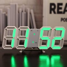 an alarm clock is sitting on a table