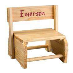 a wooden personalized children's chair with the word, emerson written on it