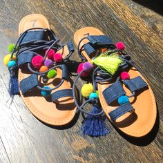 Never Worn. Size 7. Denim Sandals With Long Chord That Wraps Around Legs And Then You Tie It. Can Be Styled Many Ways. Multicolored Pom Poms And Tassels. As Is. Super Cute For Summer! Denim Flat Sandals For Vacation, Denim Blue Flat Sandals For Summer, Blue Denim Sandals For Vacation, Blue Denim Sandals For The Beach, Flat Denim Blue Sandals For Summer, Flat Denim Sandals For Vacation, Denim Blue Sandals For Vacation, Summer Denim Sandals For The Beach, Blue Denim Beach Sandals