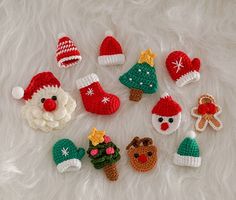 crocheted christmas ornaments arranged on white fur