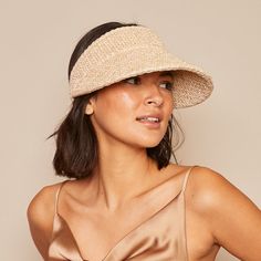 Practical and chic, the Micky visor will become your must-have when packing for sun-soaked vacations. It's woven from a lightweight cream straw with gold flecks that shimmer subtly in the light. Finished with an elastic back lined with smooth satin for a luxurious hold.Measurements: HEADSIZE: 6" / CROWN: 3" / BRIM: 4"PackableSpot cleanImported The Curated Closet, Straw Visor, Straw Hats, Gold Flecks, Eugenia Kim, Visor Hats, Cream And Gold, Straw Hat, Straw