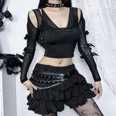 Discover dark romance with our Gothic Cut Out Mesh Long Sleeve Crop Top. The detailed cutouts and mesh sleeves bring a hint of mystery, while the cropped length and double layer design offer a contemporary look. Crafted from black polyester and spandex, this top radiates luxury and sophistication. Ideal for those seeking to make a stylish statement with elegance. Detailed cutouts Mesh sleeves Cropped length Double layer design Black polyester & spandex Gothic Mesh Top For Spring Party, Spring Gothic Party Mesh Top, Spring Party Gothic Mesh Top, Spring Gothic Mesh Top, Gothic Party Top With Mesh Sleeves, Gothic Party Tops With Mesh Sleeves, Edgy Black Mesh Top For Club, Gothic Mesh Top For Night Out, Gothic Mesh Top With Mesh Sleeves For Night Out