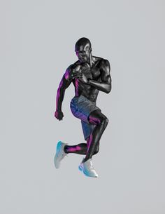 a man is jumping in the air with his body painted purple and blue while wearing running shoes