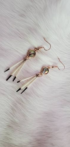 These are made with ethically sourced Porcupine quills, And a beautiful mother of pearl shell inlay, Porcupine Jewelry, Porcupine Quill Jewelry, Quill Jewelry, Porcupine Quill Earrings, Quill Earrings, Bullet Earrings, Porcupine Quills, Stick Earrings, Round Leather