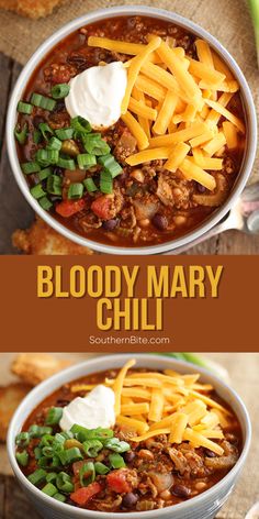 two bowls filled with chili and cheese on top of a wooden table next to bread