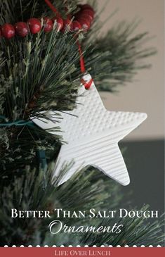 a white star ornament hanging from a christmas tree with the words better than salt dough ornaments