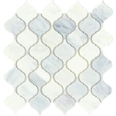 a white and grey tile pattern