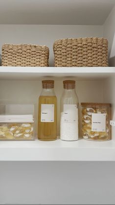 the shelves are filled with different types of food and storage containers, including bread rolls