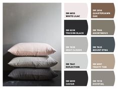 three pillows stacked on top of each other in different shades of grey and white, with the same color swatches