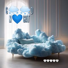 a bed made out of clouds in front of a window with the words good night on it