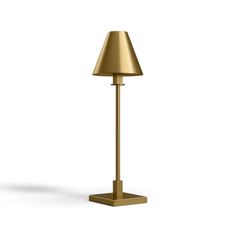 a gold lamp on a white background with the light turned off to show its dim lighting