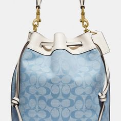 Signature Chambray And Glovetanned Leather Inside Zip Pocket Drawstring Closure, Fabric Lining Detachable Handle With 5 3/4" Drop Detachable Strap With 24 1/2" Drop For Shoulder Or Crossbody Wear Four Protective Feet At Base 8 3/4" (L) X 9 3/4" (H) X 5 1/2" (W) Style No. C4693 Vintage Leather Messenger Bag, Coach Bucket Bag, Coach Crossbody Purse, Teal Leather, Bags Coach, Coach Crossbody, Pretty Bags, Coach Crossbody Bag, Crossbody Messenger Bag