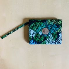 Vera Bradley Smartphone Wristlet Brand New With Tags Interior Has Separate Zippered Area & Card Slot Area Buckle On Front Still Has Protective Plastic On The Metal, It’s Not Scratched Blue Rectangular Wristlet For Everyday Use, Green Pouch Wristlet For Daily Use, Trendy Green Rectangular Wristlet, Everyday Blue Pouch Wristlet, Blue Clutch Wristlet For Travel, Green Trendy Wristlet For Everyday Use, Trendy Green Wristlet For Everyday Use, Blue Rectangular Wristlet As Gift, Trendy Blue Wristlet For Everyday Use