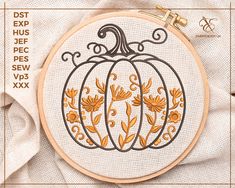 an embroidery pattern with a pumpkin on it