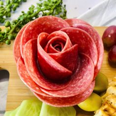 a close up of food on a cutting board