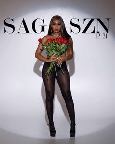 a woman in tights holding roses and posing for the camera