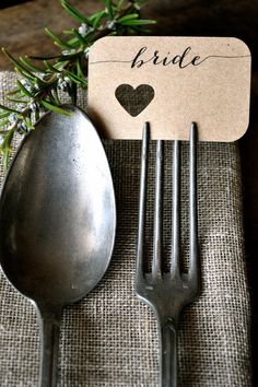 a couple of forks sitting on top of a table