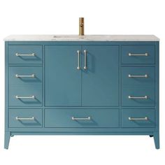 a blue bathroom vanity with gold handles and drawers