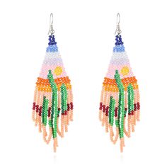 PRICES MAY VARY. 🌈Bohemian Beaded Dangle Earrings: Long beaded statement tassel earrings with cactus pattern, nature seed bead earrings add ease, freedom and enthusiasm to your look. 🌈Size of Tassel Drop Earrings: Long beaded fringe earrings are made of high quality seed beads, each bead is carefully selected and threaded, mini statement bohemian earrings length: 4.7 inch, width: 1.5 inch. 🌈Various Colors to Match Your Clothes: Handmade beaded tassel earrings are compatible with everything in Summer Fringe Chandelier Drop Earrings, Summer Fringe Dangle Chandelier Earrings, Festival Dangle Earrings With Dangling Beads, Beaded Dangle Chandelier Earrings For Beach, Summer Beaded Fringe Tassel Dangle Earrings, Beaded Fringe Dangle Tassel Earrings For Festival, Summer Beaded Tassel Drop Earrings, Beach Dangle Jewelry With Beaded Fringe, Beaded Tassel Earrings For Beach