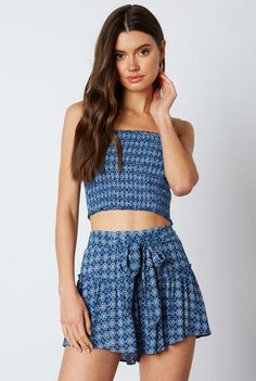 Final Sale - Get it before it's gone! Take the some time to escape in the Mykonos Blue Print Cropped Two-Piece Skort Set! Inspired by the bohemian blue and white Mykonos landscape, and made for perfect sunny days. Features tube top with a matching pair of relaxed, high-waisted shorts decorated in a rich boho blue and white print. A tying front waist create a cute skort effect. Pair with flats or heels to mix up your look! DETAILS & CARE Rayon. Hand wash cold. Imported. Easy Braid Styles, Two Piece Romper, Mykonos Blue, Sundresses Women, Boho Jumpsuit, Striped Two Piece, Blue Two Piece, Boho Pink, Two Piece Jumpsuit