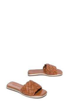 Braided straps add an extra element of sophistication to this classic slide sandal. 1" heel Cushioned footbed Leather upper and lining/rubber sole Made in Brazil Brown Slides With Flat Heel And Removable Insole, Classic Flat-heel Sandals For The Beach, Leather Slides With Woven Details, Classic Woven Sole Sandals For Summer, Classic Slide Sandals For Vacation, Classic Synthetic Slides For Vacation, Brown Slides With Woven Sole For Vacation, Classic Summer Sandals With Woven Sole, Classic Brown Mules For Beach