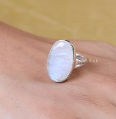 Rainbow Moonstone Ring, 925 Sterling Silver Ring, Oval Shaped Ring, Gemstone Ring, Handmade Ring, Ring for Women, Crystal Ring, Boho Ring Gemstone Name - Rainbow Moonstone  Stone Quality - AAA Ring Weight - 6.84 gm Length - 2.5 cm Width - 1.5 cm Stone Shape - As shown in the picture You'll get the exact product as shown in the pictures We serve complete 925 sterling silver Jewelry and genuine properties of the stone. The products are dispatched from the small business from USA. Product Quality a White Oval Moonstone Ring With Large Stone, Large Oval White Moonstone Ring, Large Oval Moonstone Ring, Oval Crystal Ring With Natural Stones For Anniversary, Oval Moonstone Ring With Natural Stones, White Oval Ring With Natural Stones, White Oval Rings With Natural Stones, Oval White Rings With Natural Stones, White Oval Crystal Gemstone Ring