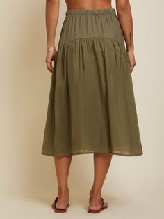 This vintage-inspired midi skirt features an elastic waistband, contrast voile tier and that oh-so-flattering yoke shape that accentuates all the right curves. The perfect throw-on-and-go piece to add a feminine touch to your favorite tee and sandals combo. (This one comes in Ivy.) Wear it with the Cameo Tank. | Women's Helena Skirt in Ivy | Ethical Essentials Ivy, Midi Skirt, Vintage Inspired, Elastic, Sandals, Skirt, Green, How To Wear