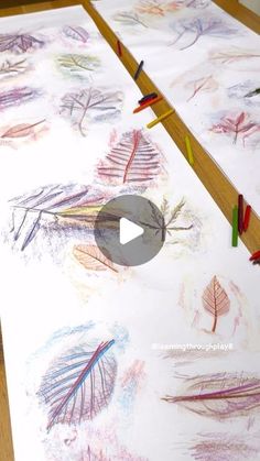 an image of children's drawing on paper with crayons