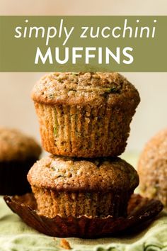 three muffins stacked on top of each other with the words simply zucchini muffins above them