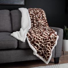 a blanket that is on top of a couch