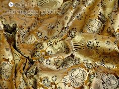 "Brown Gold Indian Brocade Fabric By The Yard Blended Silk Wedding Dress Bridesmaid Banarasi Lehenga Sewing Crafting Home Decor Costumes. This is a beautiful heavy benarse blended silk brocade floral design fabric in Brown, black and Gold. ➤Product: Brocade Fabric ➤Fabric Type: Blended Silk (Viscose + Rayon and 30% Silk) Fine quality Zari Brocade Weaving from Banaras ➤Color: Brown, Black and Gold ➤Width: 44 inches. ➤Condition: New ➤ Code: bg2120 ➤Listing for 1 Yard of fabric. ➤Care: Dry Clean On Fitted Gold Embroidered Fabric For Ceremony, Festive Fitted Brocade Fabric, Embroidered Fitted Brocade Fabric, Gold Embroidered Fabric Fitted For Traditional Drape, Fitted Gold Fabric For Wedding, Gold Fitted Wedding Fabric, Fitted Formal Brocade Fabric, Formal Fitted Brocade Fabric, Ceremonial Gold Brocade Embroidered Fabric