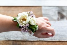 a woman's arm with flowers on it