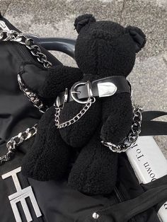 Dimensions: 10.2 in | 26 cm Including Metal chain: 47.2 in | 120 cm Belt buckle: can be adjustable The Black Bear Plush Toy can be worn as a bag with the chain, but please note that there is no pocket, only use it as an accessory. The belt buckle can be used as a choker, buckle thigh strap, various wearing methods. Trendy Black Chain Belt With Chain Strap, Adjustable Black Chain Link Belt, Black Chain Belt As Fashion Accessory, Teddy Bear Aesthetic, Creepy Stuffed Animals, Bear Aesthetic, Black Teddy Bear, Aesthetic Grunge Outfit, Estilo Punk