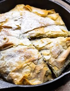 a close up of a pie in a pan with the title text above it that reads moroccan chicken pasta savory skillet chicken pie