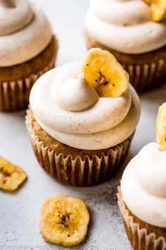 cupcakes with frosting and banana slices on top