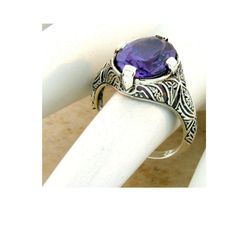 Vintage Estate 6.00 Carat Lab Created Color Changing Alexandrite Solitaire Filigree Ring. Stone Changes Color When Exposed To Different Lighting Conditions. 925 Solid Sterling Silver. Stamped 925. Excellent Condition/Like New. Classic Silver Amethyst Ring With Filigree, Classic Silver Filigree Amethyst Ring, Classic Sterling Silver Amethyst Ring Gift, Ornate Sterling Silver Amethyst Ring For Anniversary, Engraved Silver Amethyst Ring In Sterling Silver, Classic Handmade Amethyst Ring For Formal Occasions, Silver Amethyst Ring With Intricate Design, Handmade Classic Amethyst Ring For Anniversary, Handmade Classic Amethyst Ring For Formal Occasions