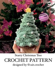 a crocheted christmas tree is shown in front of a christmas tree with poinsettis