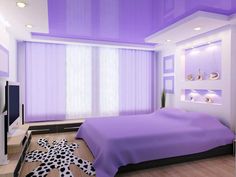 a bedroom with purple walls and white curtains on the windowsills is decorated in black and white cowhide rugs