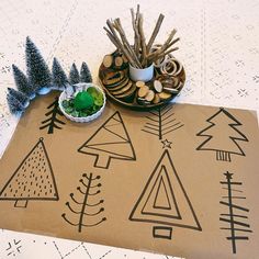 a table topped with lots of different types of trees