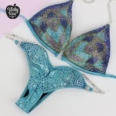 "A bright and attractive Teal Lily Designer Competition Bikini will set you apart from the crowd. Perfect tailoring will emphasize your dignity. Hard molded triangle top with push up and Scrunch brazilian cut bikini will successfully highlight your beautiful and muscular body. Undoubtedly this Designer Bikini will only complement your Competition look. Surprise the judges with your Bright and Elegant Bikini Suit! ❤ Fully lined ❤ Hard molded triangle top with push up ❤ Beautiful sparkle appearanc Blue Beachwear Party Set, Turquoise Triangle Top Swimwear For Party, Fitted Multicolor Sets For Poolside, Multicolor Fitted Sets For Poolside, Fitted Multicolor Beachwear Sets, Competition Jewelry, Holographic Fabric, Posing Suits, Brazilian Cut