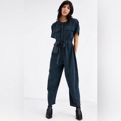 Nwt Asos Navy Blue Jumpsuit. Short Sleeve. Zip Front With Metal Snaps. Fabric Is Soft And Almost Suede-Y To The Touch. 22 Inches Across At Waist, 57 Inches Vertical. Smoke-Free Home. Blue Denim Workwear Jumpsuit With Short Sleeves, Blue Short Sleeve Denim Jumpsuit For Work, Pockets Overall Jumpsuit For Night Out, Chic Blue Jumpsuits And Rompers With Pockets, Blue Overall Jumpsuit For Work, Blue Short Sleeve Jumpsuits For Work, Blue Short Sleeve Jumpsuits And Rompers For Night Out, Blue Short Sleeve Jumpsuit For Night Out, Chic Blue Denim Jumpsuit With Pockets