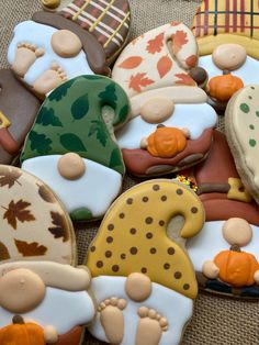 decorated cookies sitting on top of a table