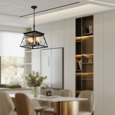 a dining room table with chairs and a light fixture hanging from it's ceiling