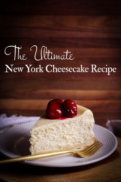 the ultimate new york cheesecake recipe on a white plate with gold fork and cherries